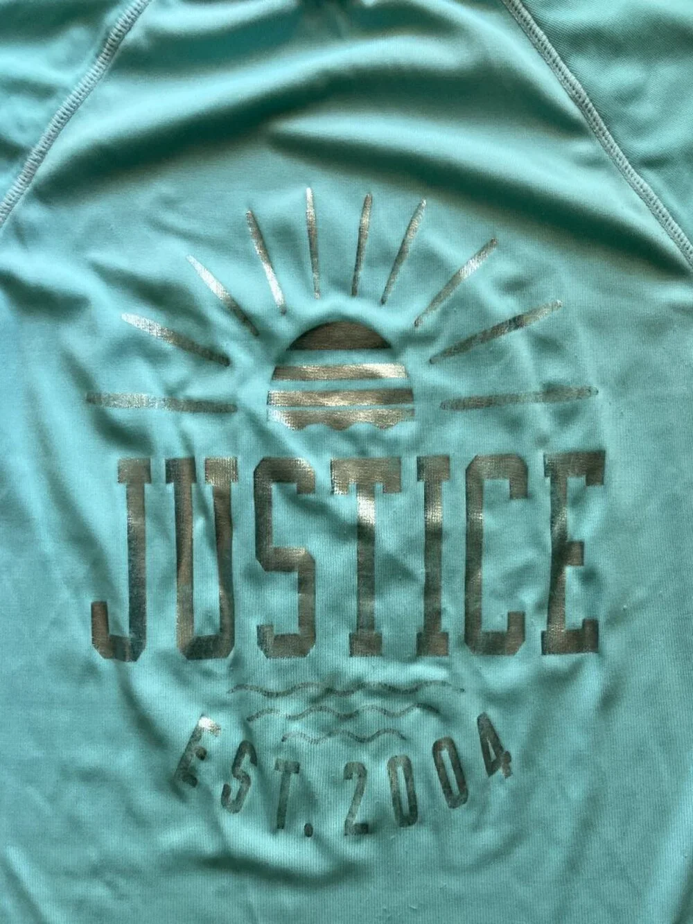Vintage Justice Light Blue Short-Sleeve Rashguard with Silver Writing